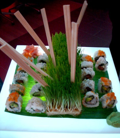 CuisineWorks Events provided sushi on glowing trays.