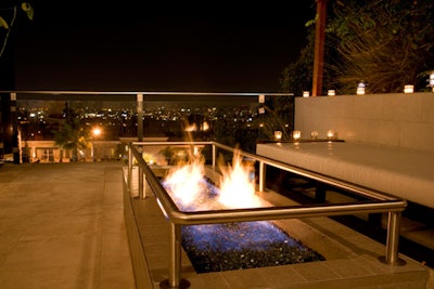 A fire pit provides warmth on one of the balconies.