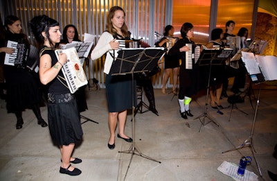 As a nod to honoree Franz West's Austrian background, the all-female accordionists of the Main Squeeze Orchestra performed at the entryway during the cocktail hour. The group of 11 women played lively tunes, including the Eurythmics' 'Sweet Dreams (Are Made of This).'