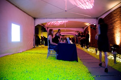 The courtyard, which served as the cocktail reception space, featured Ugo Rondinone's 'Pagan Void' installation of Day-Glo yellow gravel.