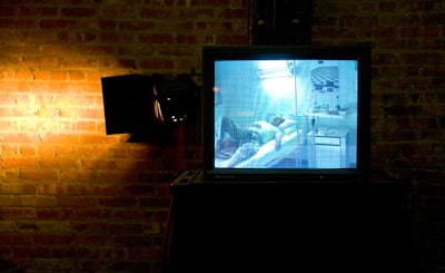 Six monitors stationed around the dining area showed footage of the absent West resting at home and in his hospital bed.