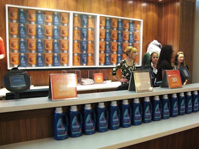 Detergent and fabric softener bottles lined the wall behind the store's register.