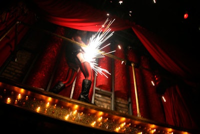 Pop-up performances took place on a catwalk-style stage throughout the night, including a pyrotechnics show.
