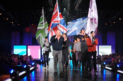Models holding a series of differently colored Union Jack flags closed the Ben Sherman segment of the fashion show.