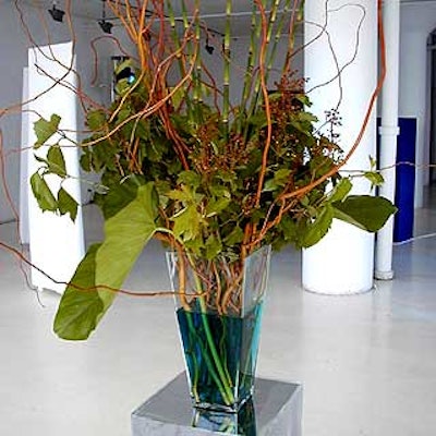Stark arrangements of branches and foliage were designed by Keiko Sato of Tentation.