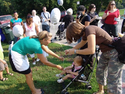 Tour staff handed out balloons to children who stopped by the Airstream with their parents.