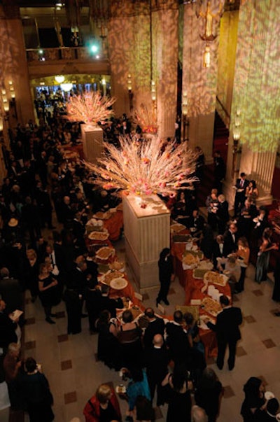The Lyric Opera of Chicago's tech department cast pink and amber autumn leaf patterns on the pillars of the opera house's Rice grand foyer.