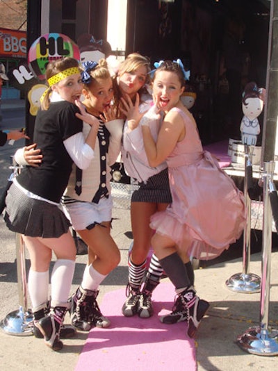 Four models dressed like Harajuku girls flanked the outside of the lounge and had photos taken with passersby.