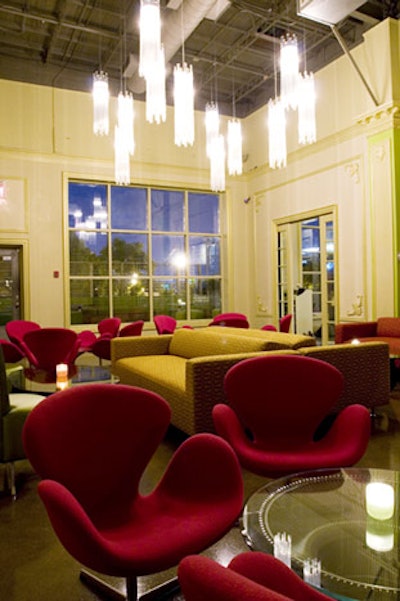 Red Knoll chairs and custom sofas fill the lounge.