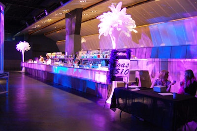 White feather towers accented both sides of the large bar.