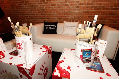 Lounges at the after-party featured T-Mobile-branded pillows and paint brushes that established an arty theme carried on by the live-action painters.
