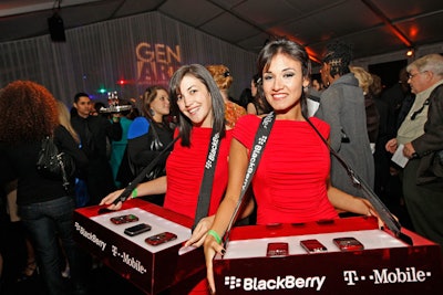 During the cocktail hour, T-Mobile brand ambassadors circulated with trays bearing new phone and BlackBerry models.
