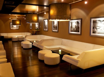 The Luxe lounge is furnished with comfortable seating areas, designed with a retro-meets-modern look.