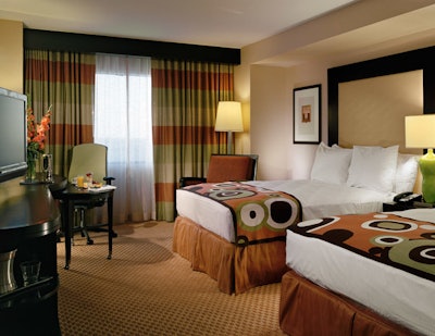The Hilton Baltimore offers a total of 757 guest rooms, each featuring a 32-inch flat-screen TV, high-speed Internet access, and custom-designed beds.