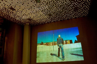 Tableaux vivants of models sporting Nudie Jeans and denim costumes were projected against the embassy's sprawling birch walls.