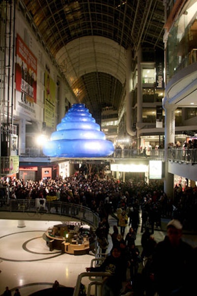 'Into the Blue,' a giant transparent cone-shaped balloon created by Fujiwara Takahiro, hung inside the Eaton Centre.