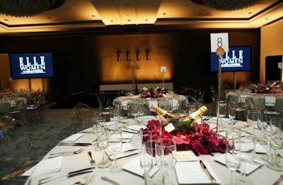 An acrylic fountain on stage featured an Elle logo.