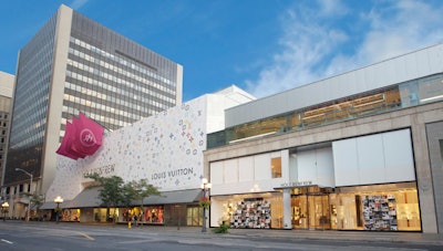 A Louis Vuitton facade covered Holt Renfrew's exterior, and a photo collage of the designer's life and work was displayed in the store's windows.