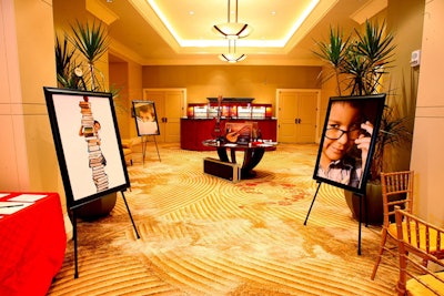 The pre-dinner reception featured poster-size photos depicting people with dyslexia, as well as silent auction items on display.