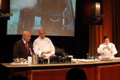 Chef Tom Colicchio hosted the event, questioning both chefs on their recipes and cooking methods.