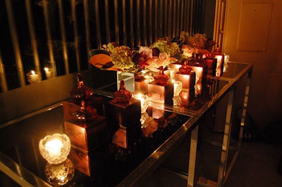 Floral arrangements from Church Street Flowers included plums and roses, two elements of the fragrance.