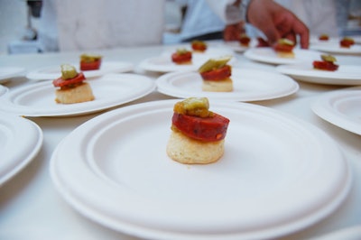 Johnny Utah's served bites of smoked chorizo and pickled okra topped with five-onion mustard.
