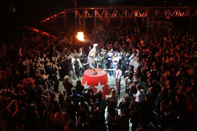 Performers included a fire eater, gymnasts, and trapeze artists.