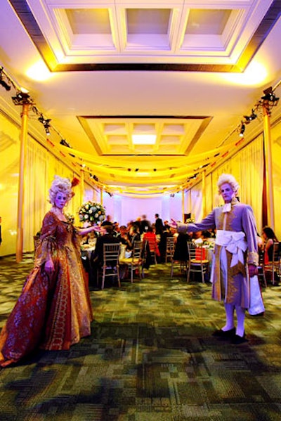 Performers dressed in Baroque-era costumes welcomed guests to the dinner.