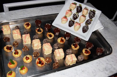 The 'Vive la France' after-party featured a roving dessert cart filled with petit fours, chocolate-dipped strawberries, and candy.