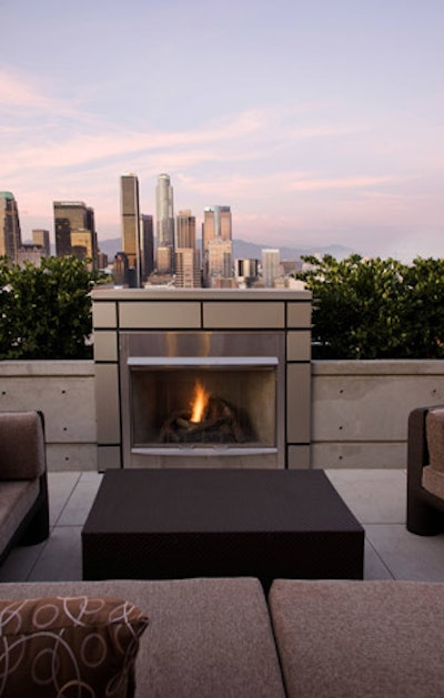 Rooftop lounge Two-Forty features an outdoor fireplace.