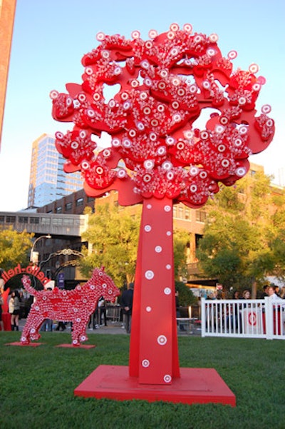 The Target Welcome Center had a parkscape filled with trees made out of lollipops and red throw pillows on the grass.