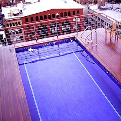 The view from the venue's rooftop garden, where white orchids in plastic globes floated on the pool's surface.