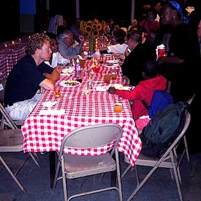 Tables were covered in picnic-style tablecloths.
