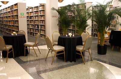 Tables sat next to book stacks during the Jewell-catered cocktail reception.