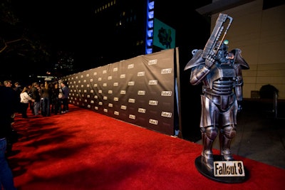 Life-size versions of characters that appear in the game decorated the red carpet.