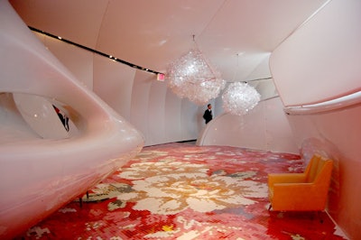 Loris Cecchini's chandelier-like installation, 'Floating Crystals (Incoherent Extensive Formations for My Deepest Vibrations),' hangs over Michael Lin's 'Untitled' floor mosaic.