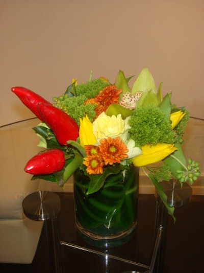 Floral arrangements provided by Flowers by Daye topped the tables.