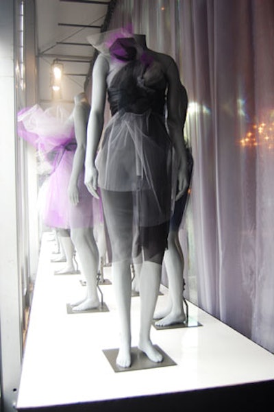 The window along the front of the main tent features a display of mannequins courtesy of Seven Continents.