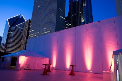 Outside the dinner tent on the theater's rooftop, pink lights and red linens played up the 'Red Hot' theme.