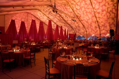 The event took place in a tent on the Harris Theater rooftop, where red drapery separated the dinner room from the cocktail area.