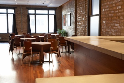 The Bristol's second floor, which is devoted to private events, features a separate bar lined with Brazilian cherry wood.