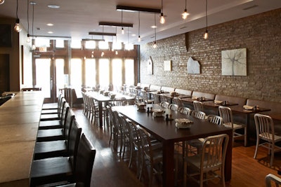 A rotating art exhibit decorates the wall of the main dining room.