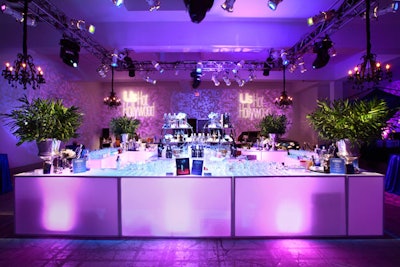 The glowing bar's changeable LEDs shifted from blue to lavender throughout the night.