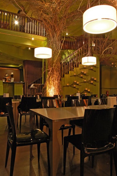 The centerpiece of the seating area is a large sculptural installation of birch, willow, grapevine, and mountain laurel branches.