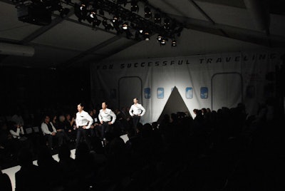 The Diesel Kids show adopted a travel theme with a backdrop designed to look like the cabin of an airplane—complete with windows offering a view of the clouds—and three models dressed as flight attendants who offered a safety demonstration on the runway prior to the show.