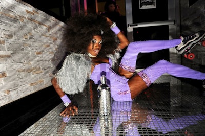 Channeling Studio 54, entertainers were outfitted in roller skates and decade-appropriate clothing.