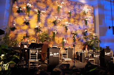 After dinner, the Stu Hirsh orchestra played dance music in Stanley Field Hall, where Heffernan Morgan created a flower-studded backdrop meant to evoke a Mexican jungle.