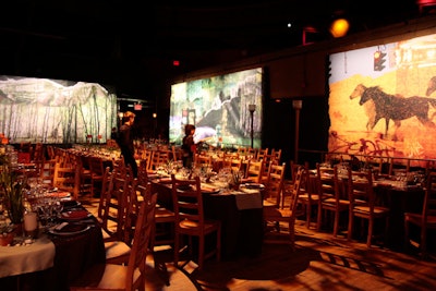 Designed so that every guest would have a view of something, the dining area was enclosed by large canvas photographs and collages.