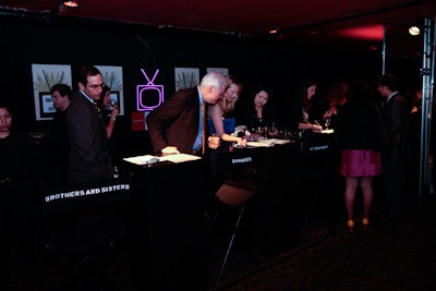In a vignette decorated with director chairs and a neon TV sign, the gala auctioned off set visits and walk-on roles for shows like Damages, In Treatment, and Brothers & Sisters.