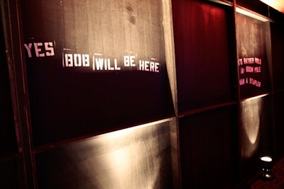Graffiti like 'Yes, Bob will be here' added a whimsical element to the decor.